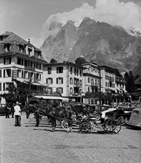 Alps Prints: Waiting carriages at Grindelwald, Switzerland