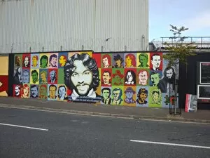 Wall mural of colourful images of people at Belfast