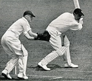 Hammond Collection: Wally Hammond hitting boundary off McCabe at Lords