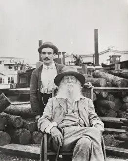 Walt Whitman, three-quarter length portrait, seated, facing