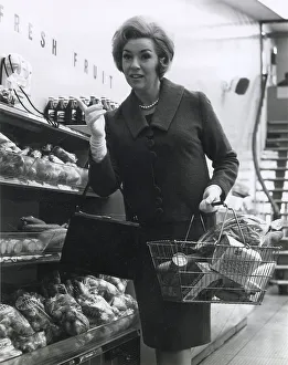 Supermarket Prints: What she wants must be over there. Date: late 1960s