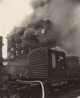 Warehouse on fire near railway line