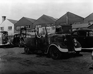 Images Dated 24th February 2011: Wartime bomb damage, Met Police vehicles, London