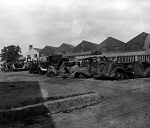 Images Dated 24th February 2011: Wartime bomb damage, Met Police vehicles, London