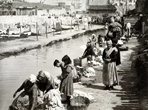 Washerwomen washing clothes in a river, Nice, France