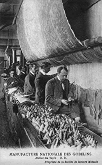 Images Dated 12th April 2012: Weavers working in a carpet factory