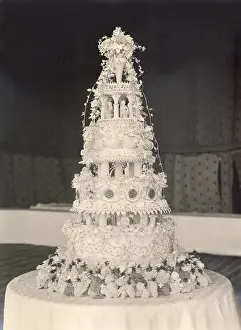 Tiered Prints: A wedding cake to be proud of, for the wedding of a British couple in India. Date: 1920