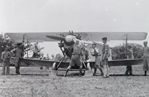 Western men on a trip to the Far East, starting the plane