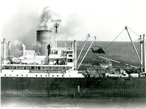 A Westland Wessex from HMS Fearless goes to the aid of t?