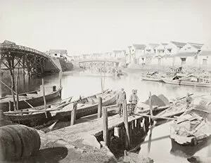 Wharf with boats and boatmen, Japan
