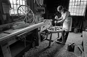 Wheelwright makinbg wooden wheels, Blists Hill, Ironbridge