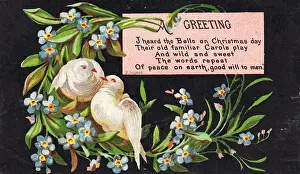 White doves and forget-me-nots on a Christmas card