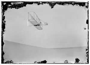 Orville Prints: Wilbur gliding to the right, bottom view of glider