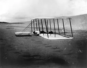 Wilbur Prints: Wilbur Wright in the 1901 glider - Kitty Hawk