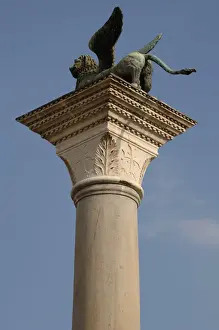 Winged lion statue of Saint Mark on a granite column in