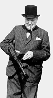 Images Dated 29th September 2015: Winston Churchill Holding a Sub-Machine Gun