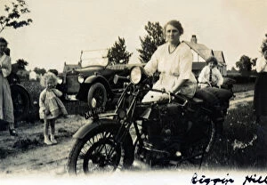 Sunbeam Collection: Woman on a 1922 Sunbeam motorcycle