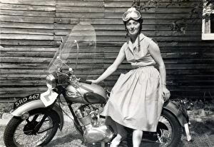 Triumph Gallery: Woman on 1950s Triumph motorcycle
