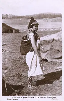 Woman of the Atlas Mountains, Morocco with baby