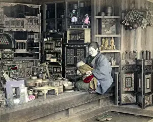 Curio Prints: Woman with baby in curio store, Japan
