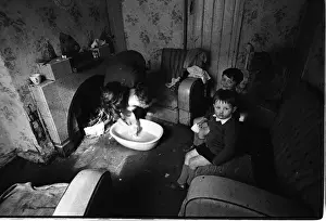 Woman bathing baby, Falls Road, Northern Ireland