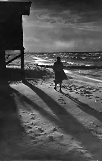 Deserted Prints: Woman on a Beach