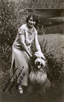 Woman with Bearded Collie