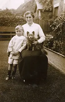 Lapdog Prints: Woman and boy with a dog in a garden