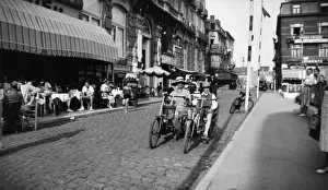 Velo Prints: Woman and boy on two-seater cycle, Bruges, Belgium