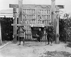 Woman in carrying litter, Japan