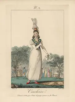 Woman of Caux in white dress, tall bonnet with lace tails at a harvest festival in an orchard