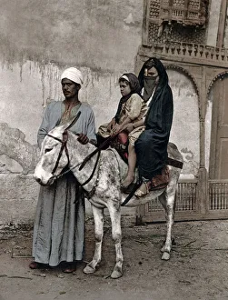 Woman and child on donkey, Cairo, Egypt, c.1890 Vintage late 19th century photograph Woman and child on donkey, Cairo, Egypt, c.1890 Vintage late 19th century photograph