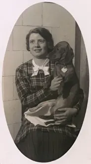 Dachshunds Prints: Woman with a dachshund on her lap