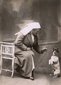 Russell Gallery: Woman disciplines a Jack Russell