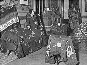 Furnishings Prints: Woman with display of homemade arts and crafts