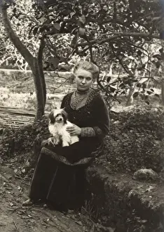 Lapdog Prints: Woman with a dog in a garden, Italy