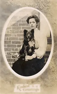 Woman with dog on her lap