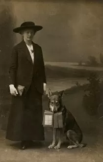 Images Dated 4th January 2012: Woman and dog in photographers studio
