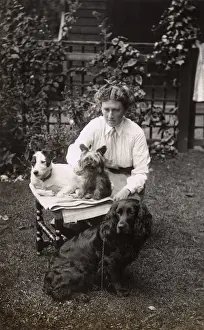 Cocker Prints: Woman with three dogs in the garden