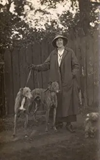 Woman and dogs in garden