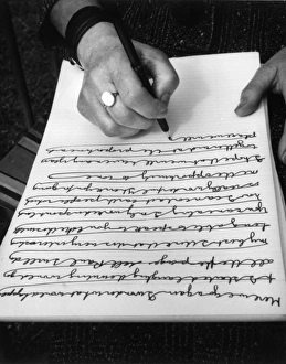 Mysterious Gallery: Woman doing automatic writing in a garden