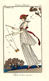 Images Dated 18th April 2019: Woman in dress of printed linen playing diabolo, 1913