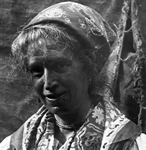 Tanned Prints: Woman dressed up for local carnival, South Wales