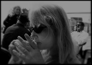 Images Dated 19th July 2016: Woman drinking coffee outside cafe