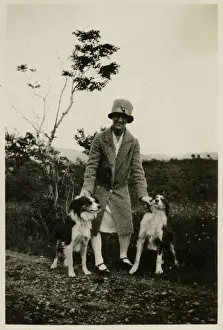 Collie Prints: Woman in a garden with two collie dogs