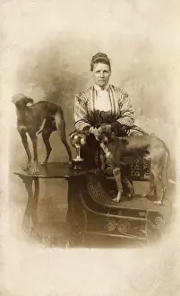 Woman with two greyhounds
