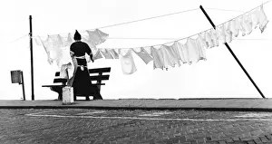 Parking Prints: Woman hanging out the washing on a line