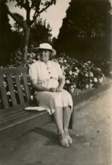 Images Dated 8th November 2011: Woman on holiday, sitting on a bench