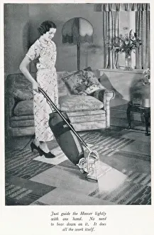 Woman hoovering