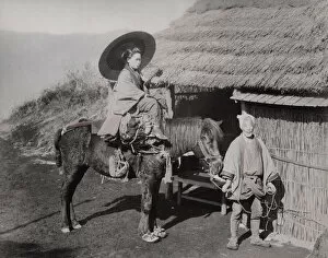 Saddle Collection: Woman of a horse being led by a farmer, Japan